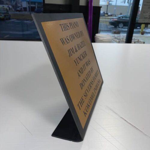 bent-plaque-looking-sign