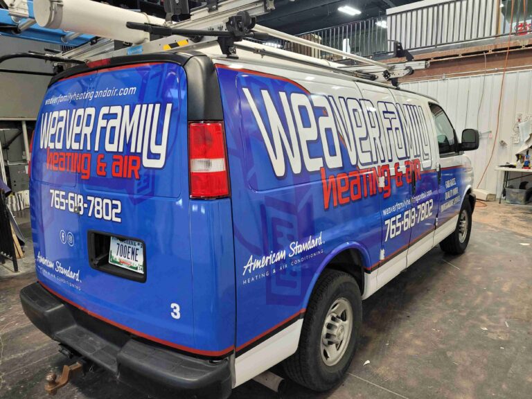 Rear passenger side view Weaver Family Heating Air vehicle graphics contact information
